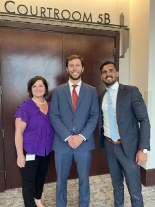 Victim Witness Coordinator Susan Tucker-Smith with Generals Eli Cheely and Luis Casas
